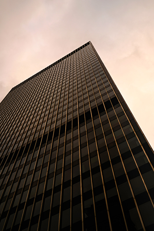 Golden tower against sky